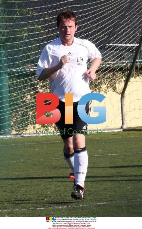 Declan Donnelly plays soccer with Robbie Williams team