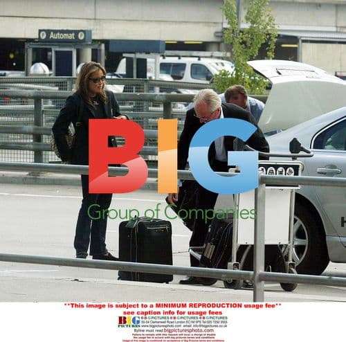 Sven-Gran Eriksson Seen with Mystery Brunette at Oslo Airport