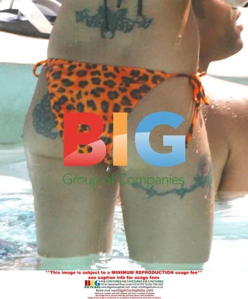 Ashley Cole and Cheryl Relax on Spanish Vacation