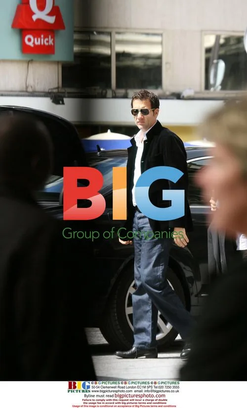Clive Owen Leaving Ritz Hotel in Paris