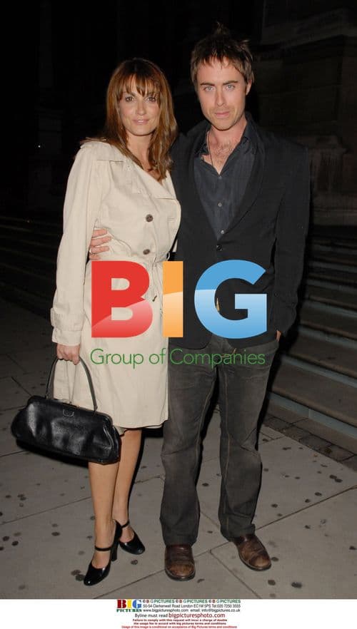 Sarah Parish and boyfriend James Murray leaving ITV party