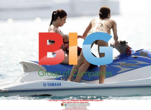 Eva Longoria in Gold Swimsuit with Tony Parker