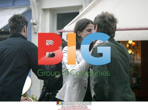 Jude Law Chats with Friends in London