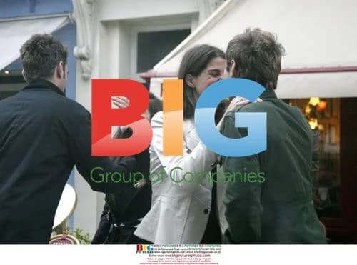 Jude Law Chats with Friends in London