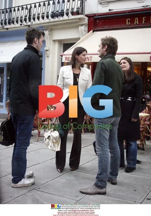 Jude Law Chatting with Friends in London