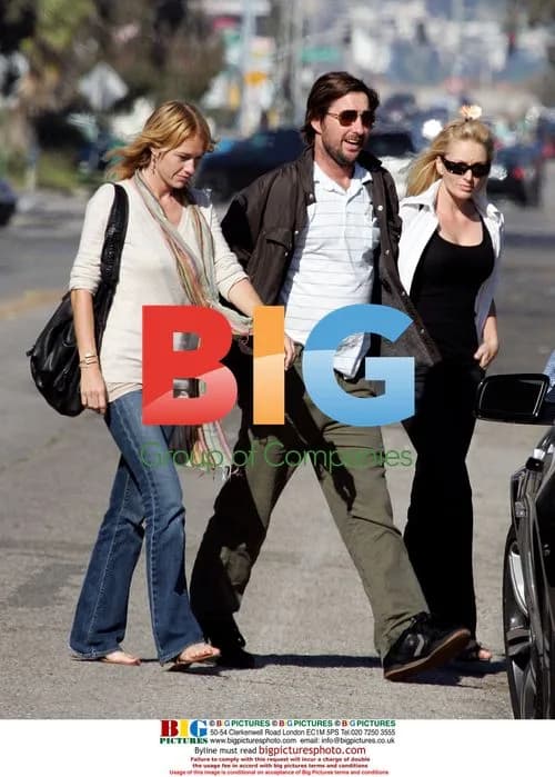 Luke Wilson with two escorts in Malibu