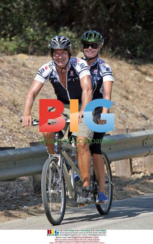 Jerry O'Connell and Rebecca Romijn on Tandem Bike