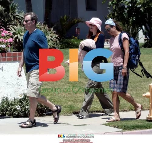 Marcia Cross takes a walk with twins