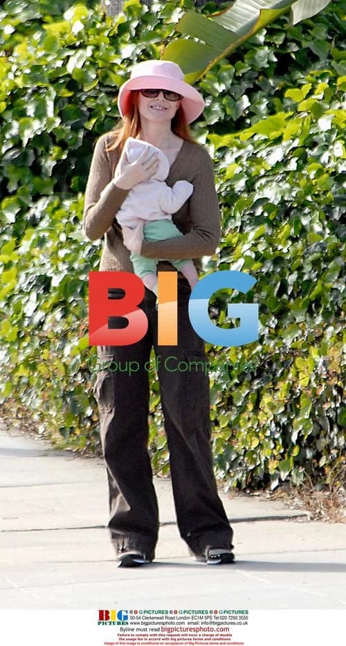 Marcia Cross takes walk with twin