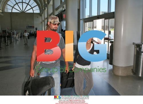 Josh Holloway and wife at LAX