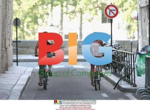Marie-Jo Perec and boyfriend bike in Paris