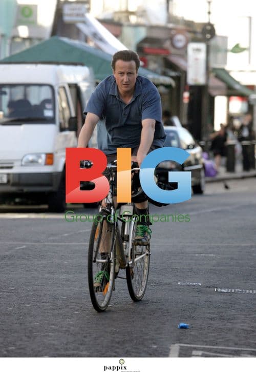 David Cameron Rides Bike Without Helmet