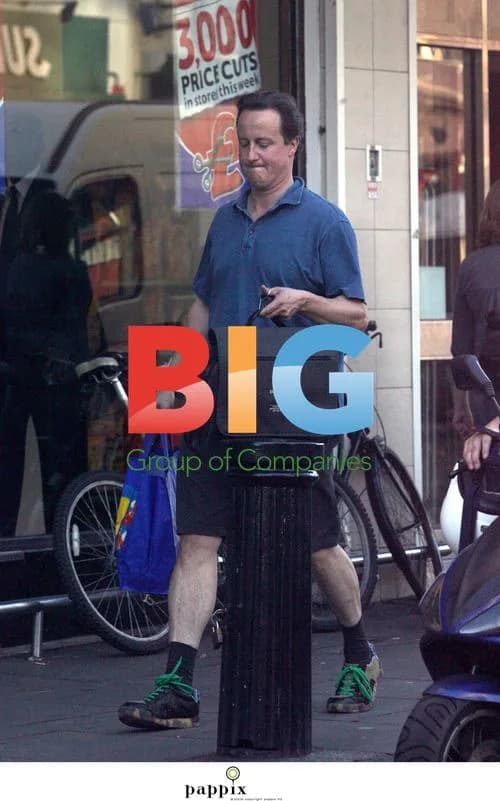 David Cameron Cycles Through Red Light