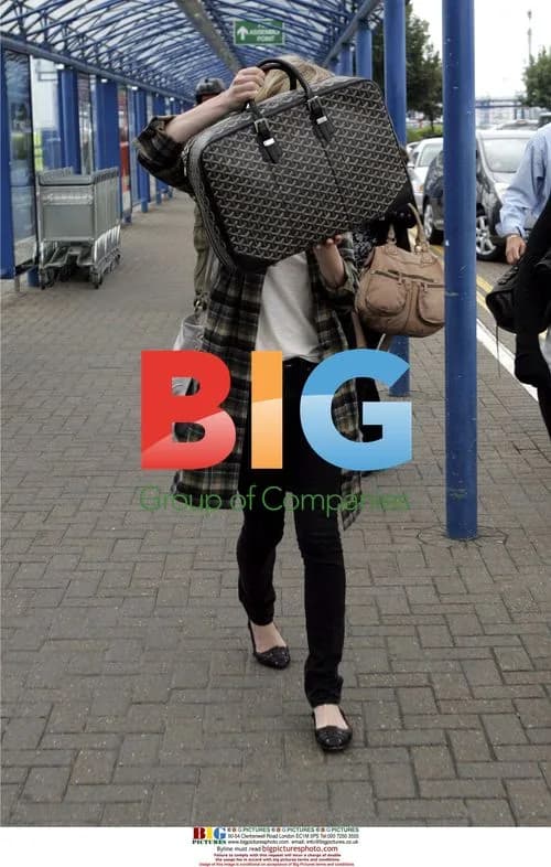 Kirsten Dunst departs London airport