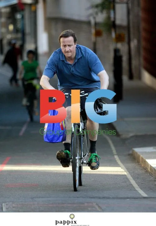 David Cameron Rides Bike Without Helmet