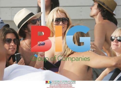 Lindsay Lohan Grabs Camera and Snaps Back at Paparazzi