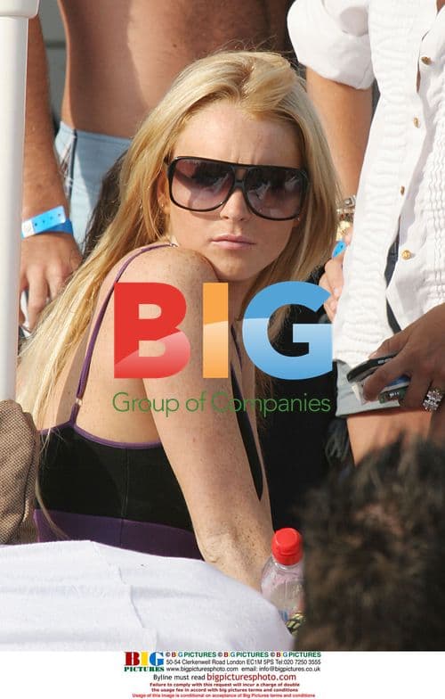 Lindsay Lohan Drinks Coke in Malibu