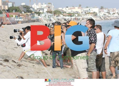 Lindsay Lohan Drinks Coke in Malibu