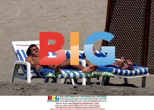 Carlos Tevez on holiday with family in Spain