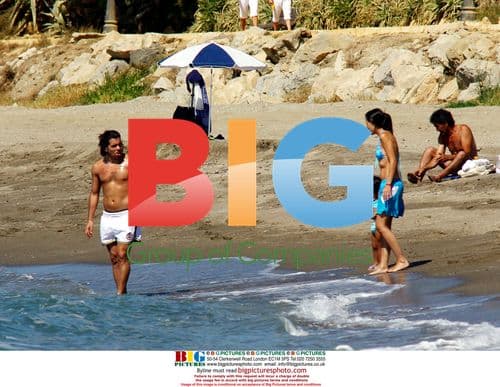 Carlos Tevez on holiday with family