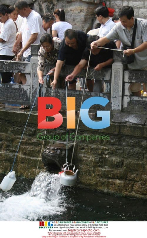 People Collecting Water at Heihu Spring