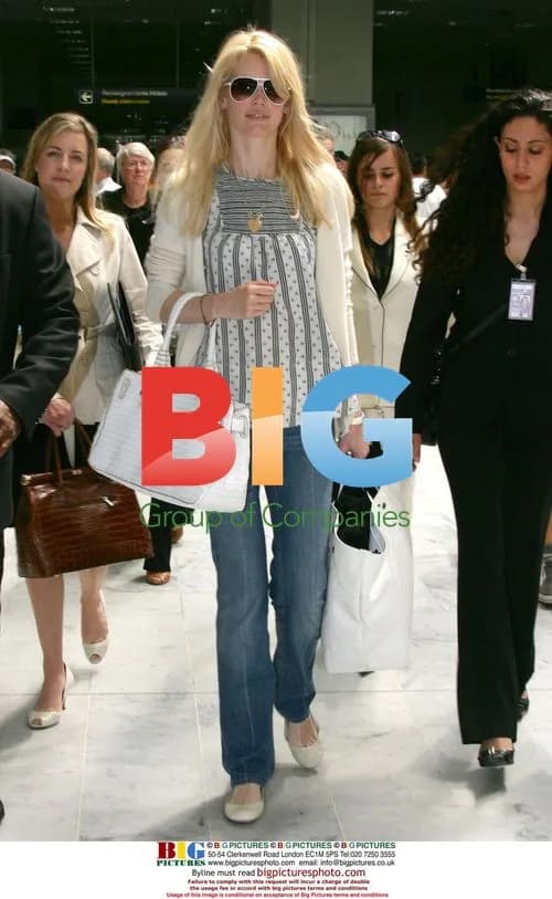 Claudia Schiffer Arrives at Cannes