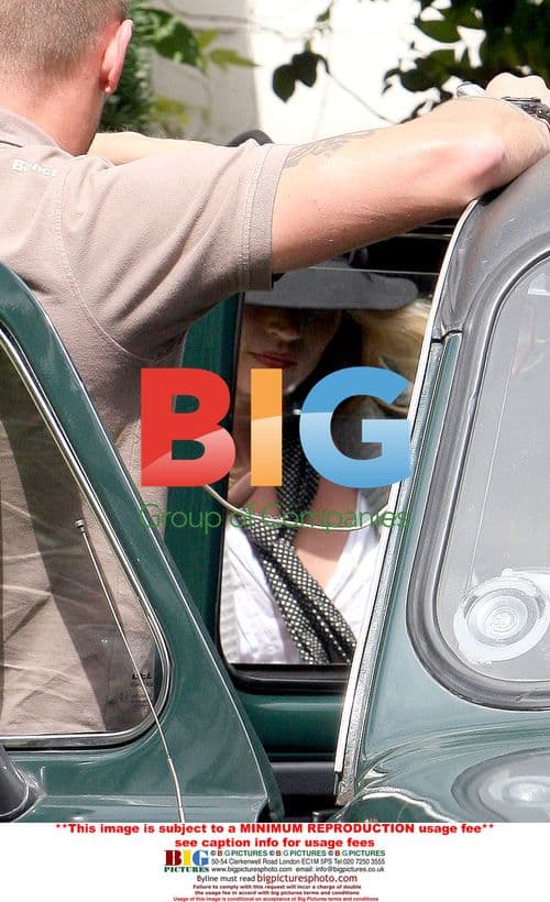 Kate Moss Gets into Cab