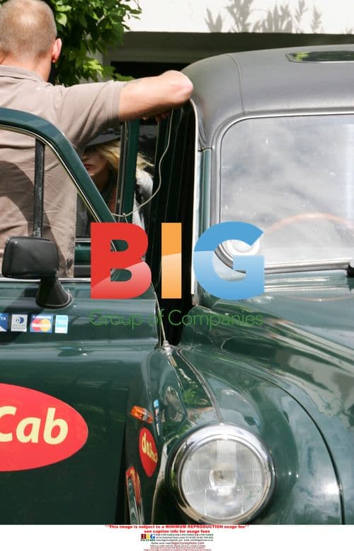 Kate Moss taking a cab after split