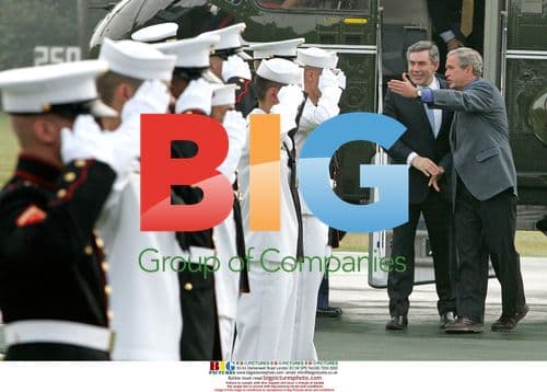 Bush Greets Brown at Camp David