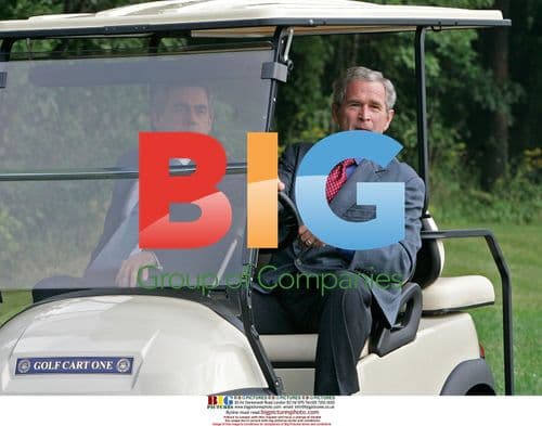 Bush Gives Brown Ride in Golf Cart