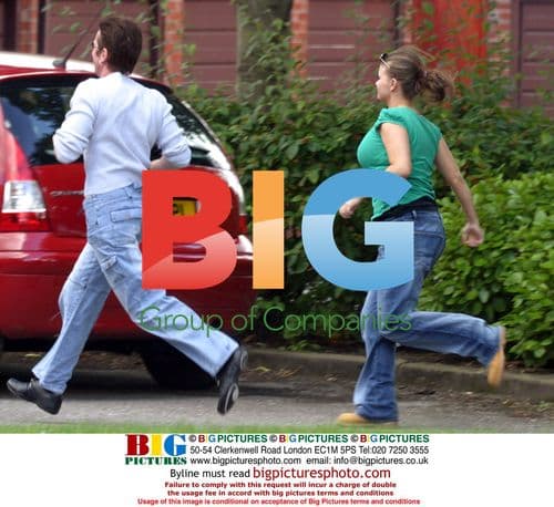 Kerry Katona runs from paparazzi