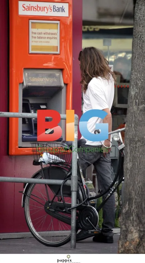 Jamie Burke Seen at London Cash Point