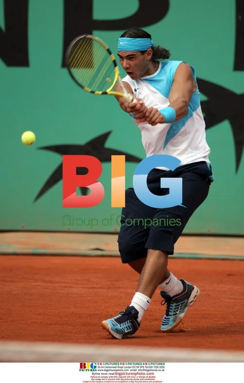 Nadal returns ball at French Open