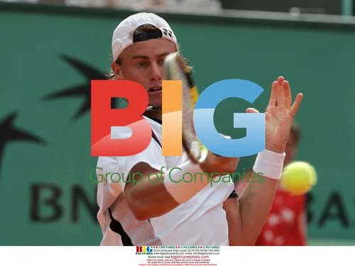 Lleyton Hewitt returns ball at French Open