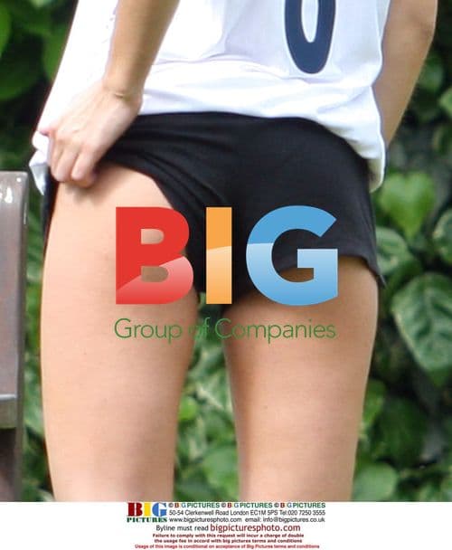 Bianca Gascoigne and her dog exercising in London park