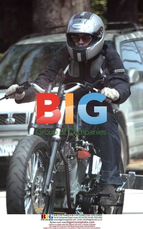 Brad Pitt Rides Motorcycle