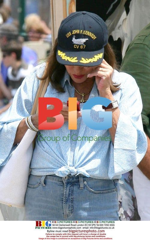 Joan Collins has a casual walk in Saint Tropez