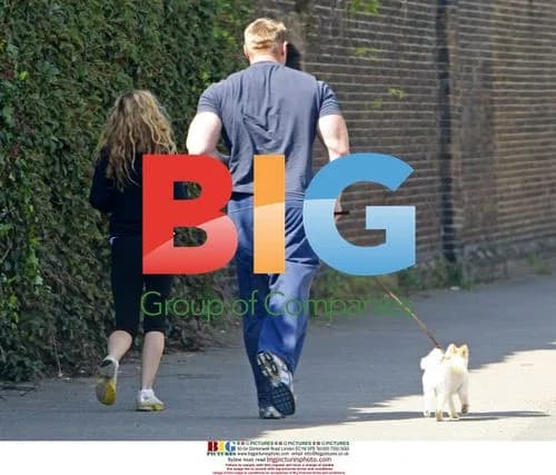 Geri Halliwell Exercising with Trainer and Dog