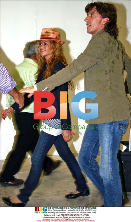 Paulina Rubio and husband arrive at Mexico D.F. airport