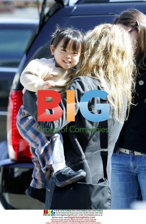 Meg Ryan departs LAX with children