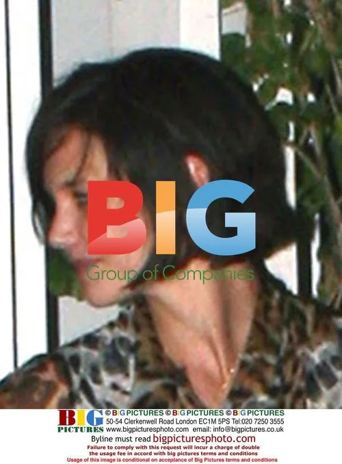 Katie Holmes Holds Door for Tom Cruise
