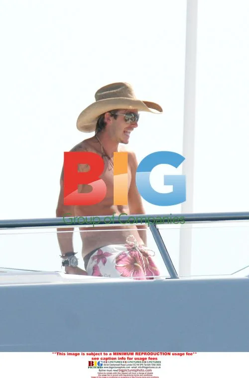 David and Victoria Beckham on yacht in Saint Tropez