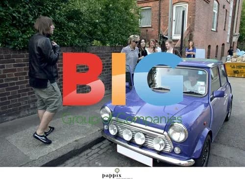 Liam Gallagher poses with teens in London