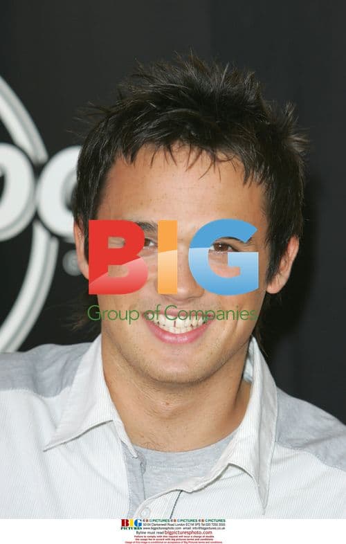 Singer Gareth Gates cuts cake at Hard Rock Cafe anniversary