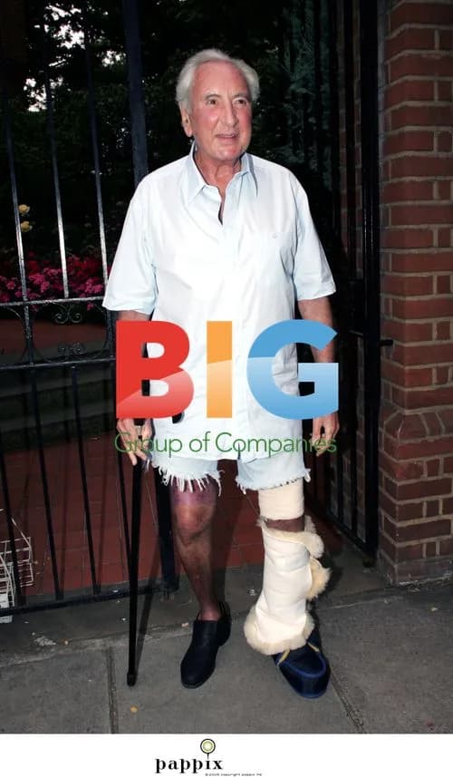 Michael Winner with Bandage and Cane