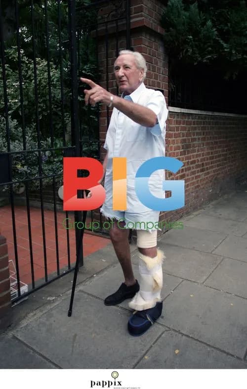 Michael Winner Leaves Home with Injury