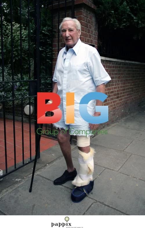 Michael Winner outside London home