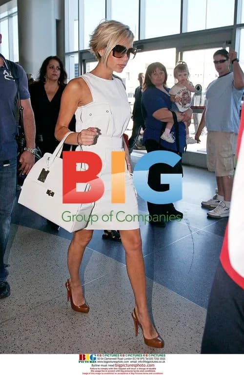Victoria Beckham Departs LAX in White Dress