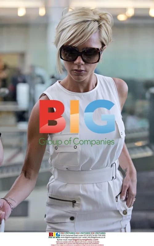 Posh Beckham Departs LAX in White Dress and Heels