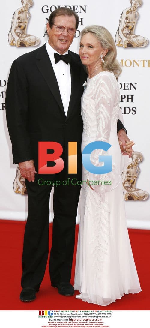Roger Moore and wife at 47th Monte Carlo TV Festival